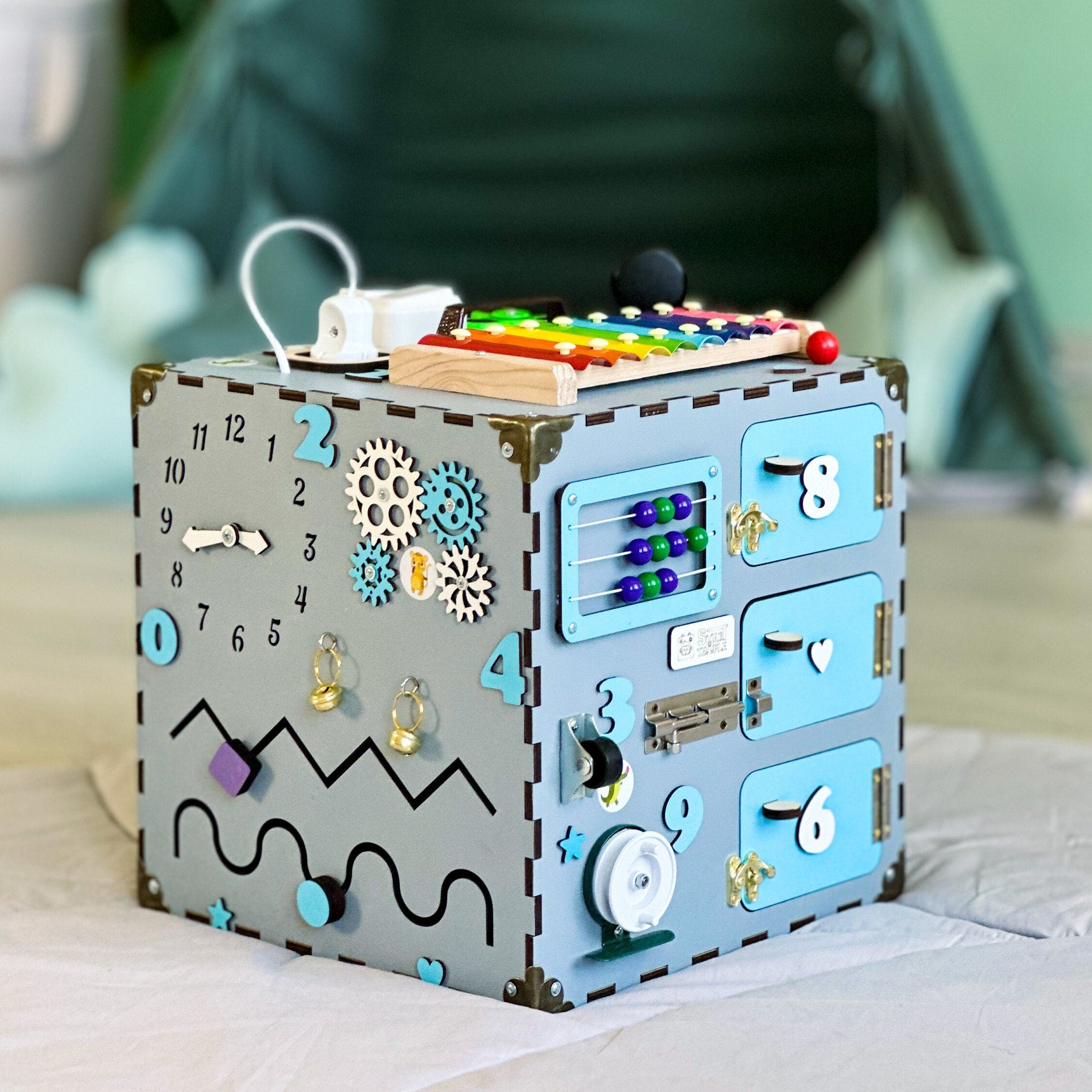 busy board cube,
busy cube baby,
wooden sensory board,
1 year old toys,
educational toys,
toddler wooden cube,
montessori busyboard,
baby activity cube,
busy board toddler,
wooden baby toys,
toddler sensory toy,
toy for toddlers,
birthday gift for kids,