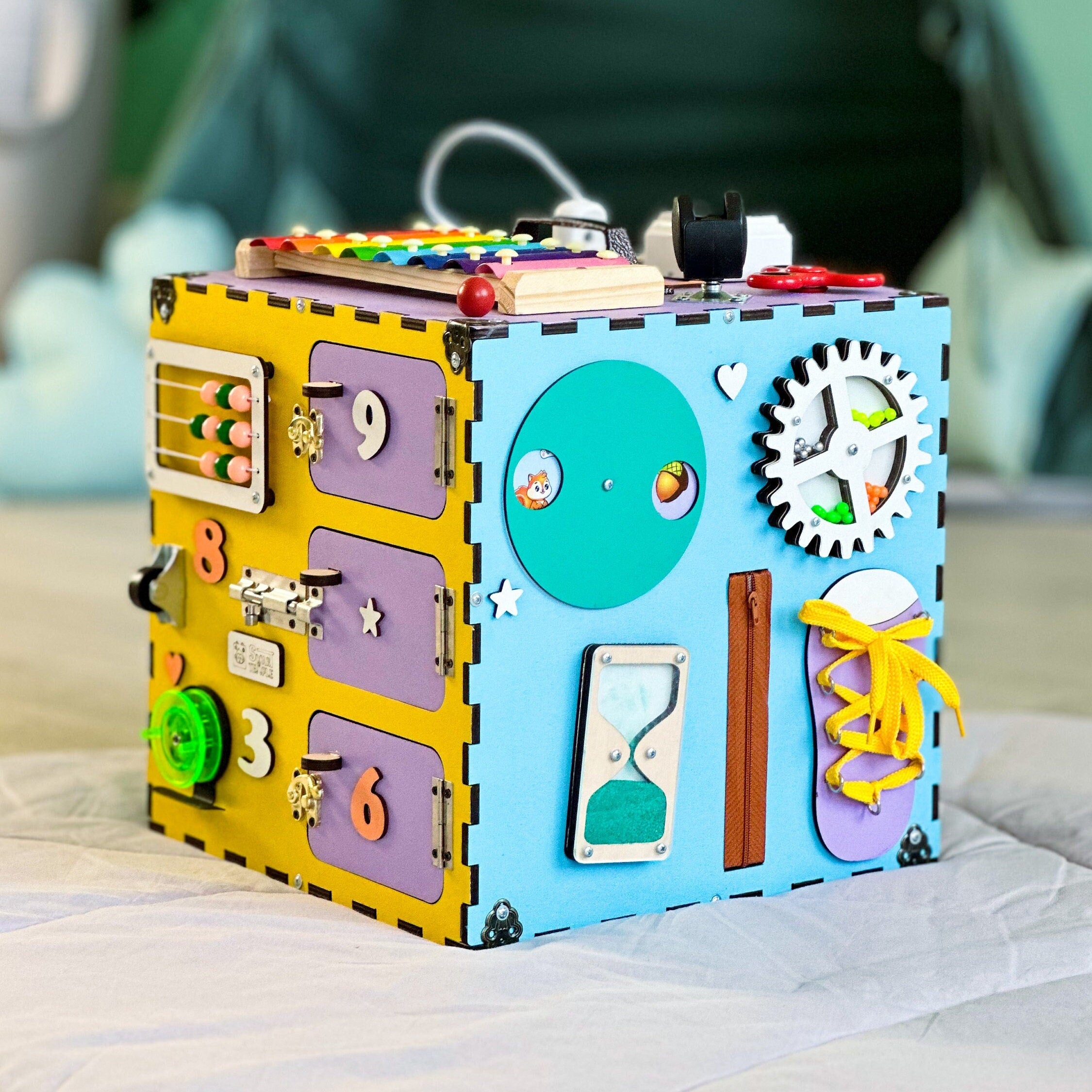 wooden toy for kids,
busy board cube,
busy cube montessori,
wooden play cube,
learning baby toy,
wooden toy for kids,
busy for toddler,
baby activity cube,
wooden montessori,
montessori cube,
montessori busyboard,
busy cube toy,
educational toys,