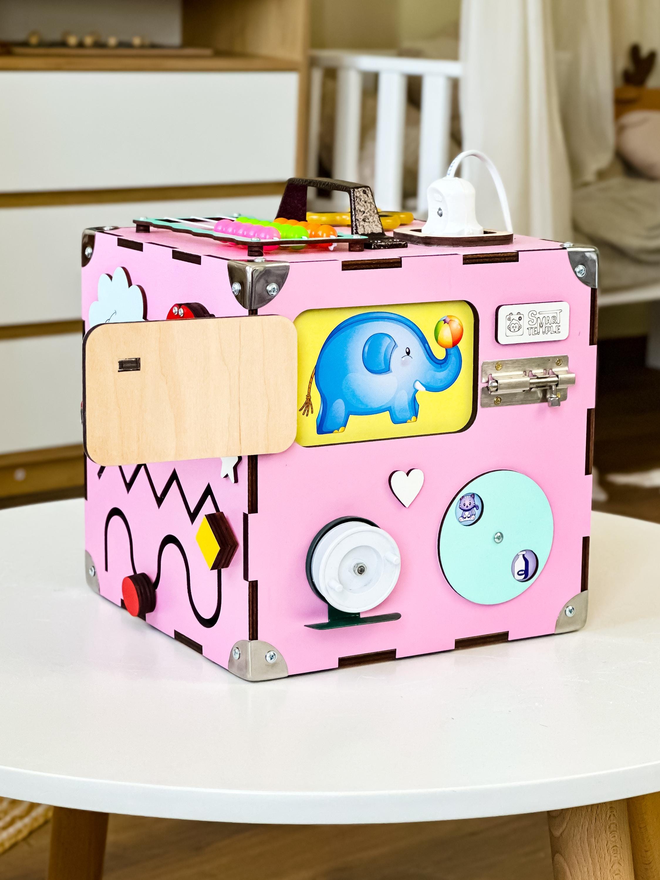 toddler wooden cube,
montessori busyboard,
baby activity cube,
busy board toddler,
wooden baby toys,
toddler smart toys,
toy for toddlers,
montessori toy,
educational toys,
busy cube montessori,
montessori cube,
sensory toys,
activity cube,