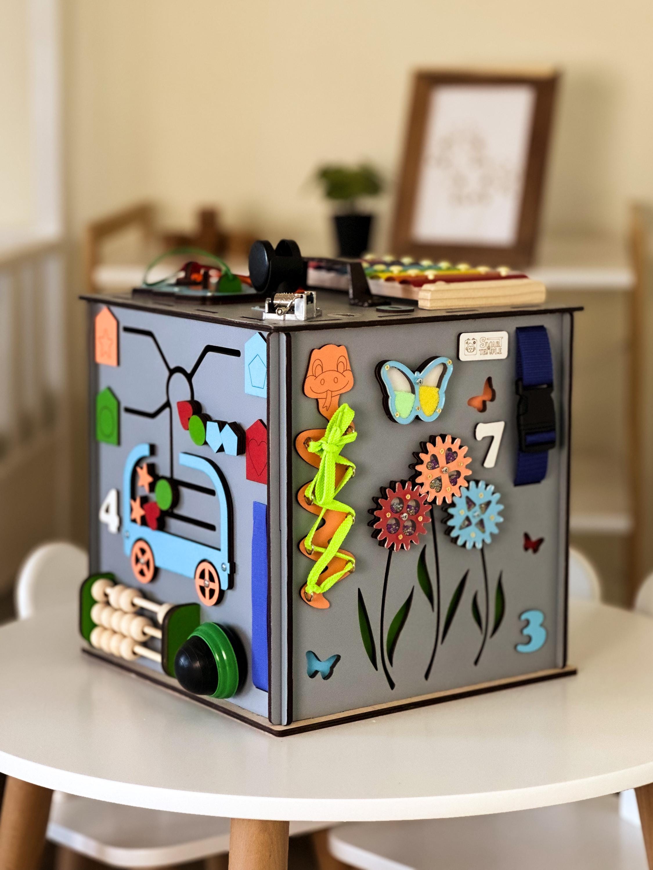 wooden toys,
busy cube montessori,
toddler sensory toy,
busycube busyboard,
busy cube kids,
toddler smart toys,
toddler busy cube,
montessori cube,
busy cube kids,
wooden toy for kids,
busy for toddler,
busy cube baby,
montessori toys,