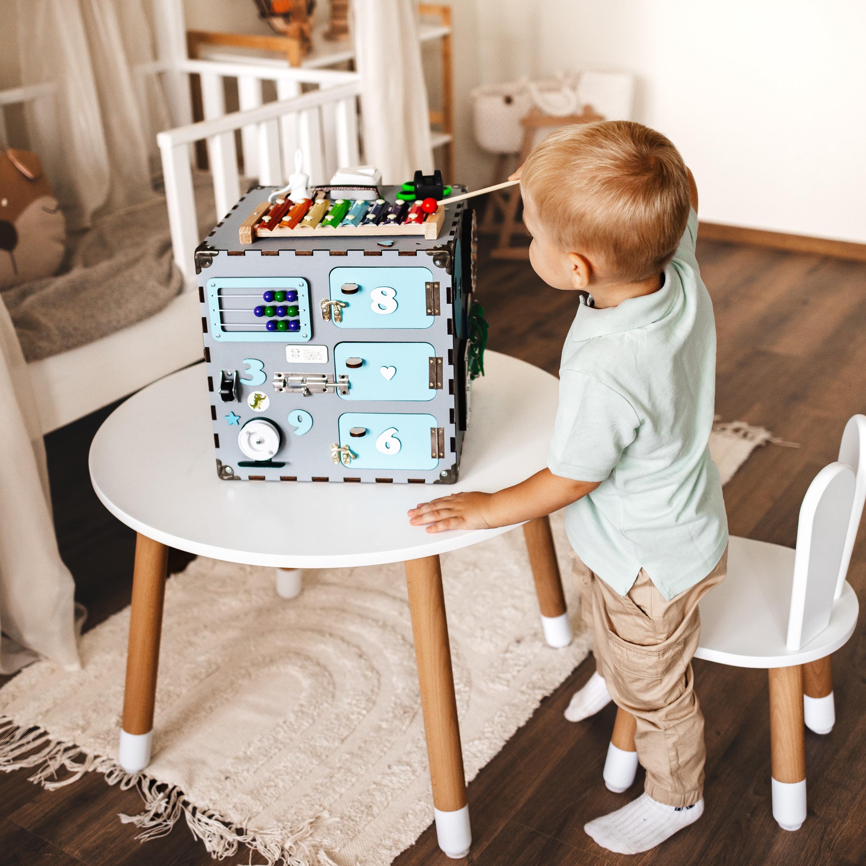 wooden toy for kids,
busy board cube,
busy cube montessori,
wooden play cube,
learning baby toy,
wooden toy for kids,
busy for toddler,
baby activity cube,
wooden montessori,
montessori cube,
montessori busyboard,
busy cube toy,
educational toys,